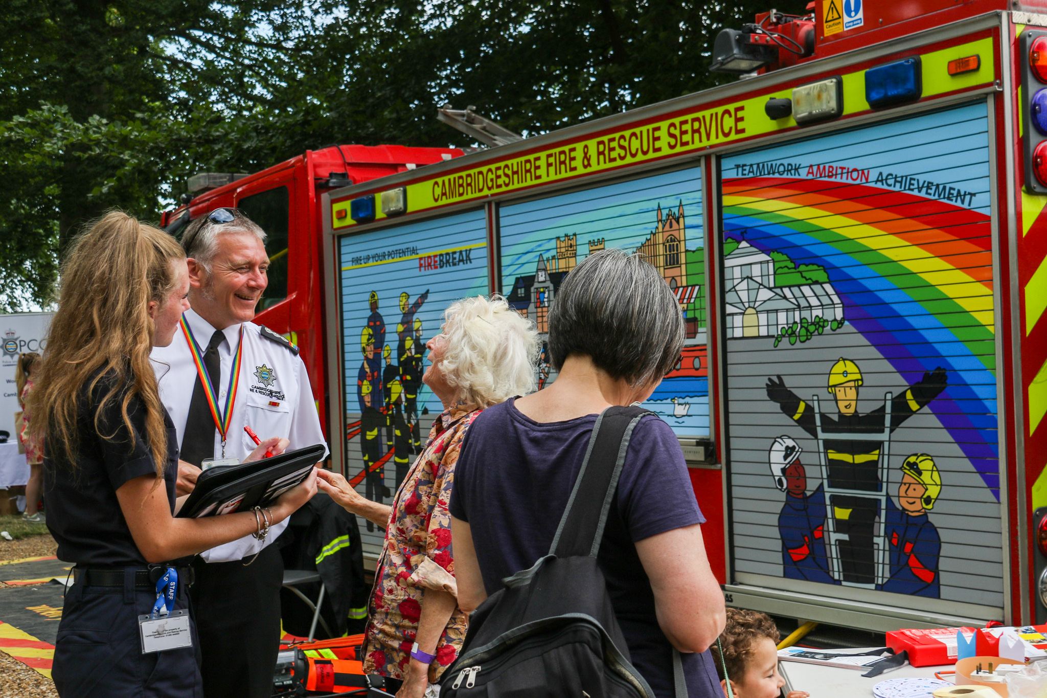 Fire officer and community safety officer at event