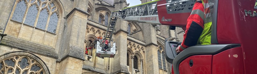 Firefighter using turntable ladder