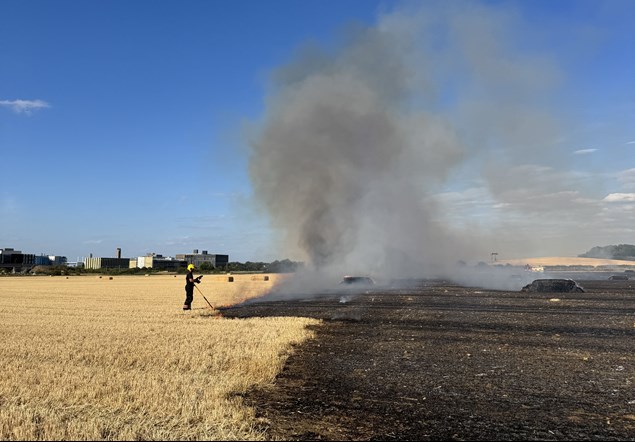 Firefighter at field fire
